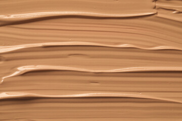 Texture of liquid skin foundation as background, closeup