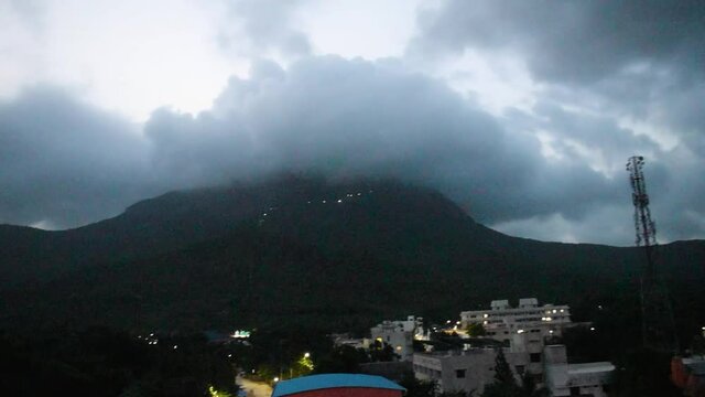 View of Girnar mountain covered with clouds during early morning. Junagadh, Gujarat, India