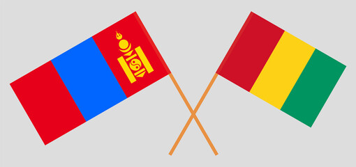 Crossed flags of Mongolia and Guinea. Official colors. Correct proportion