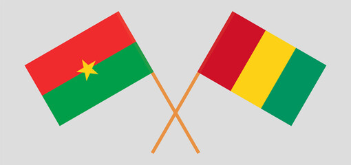 Crossed flags of Burkina Faso and Guinea. Official colors. Correct proportion