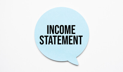 Income Statement speech bubble and black magnifier isolated on the yellow background.