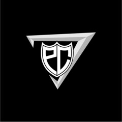 initial letter P C shield shape with triangular decoration