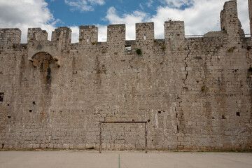 Fototapeta na wymiar Street football court by the Kamerlengo castle fortress in Trogir, Dalmatia, Croatia. 