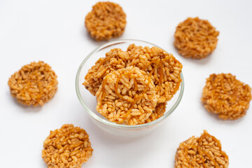 Rice cracker with coconut palm sugar on white