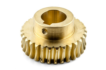 A macro photo of a new shiny copper gear, isolated on a white background, visible hole for the...