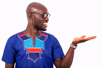 smiling young man showing empty space on his palm.