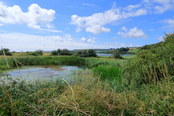 A picturesque rural landscape overlooking the lakes at Slapton Ley