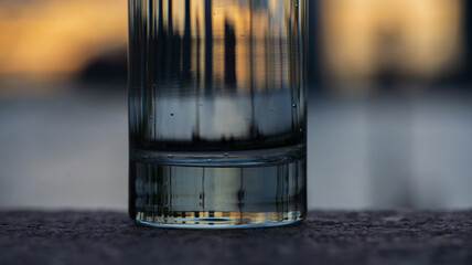 A sunset as seen through a glass 