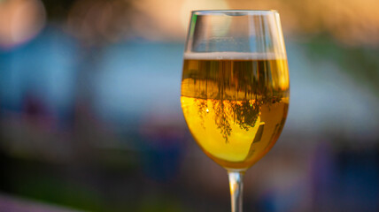 A sunset as seen through a glass 