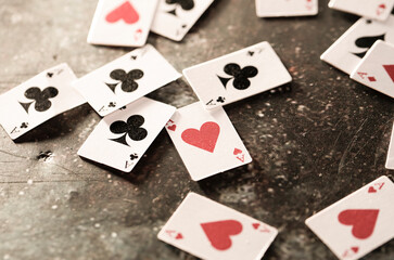 playing cards on a black