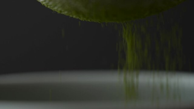 straining matcha powder with strainer