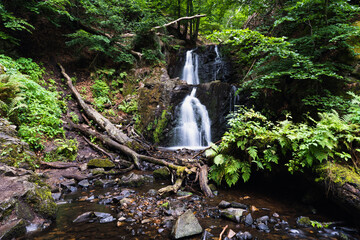 Beautiful Forsakar waterfall in Degeberga, Sweden. Captured in summer season . Nature background. Long exposure photo.