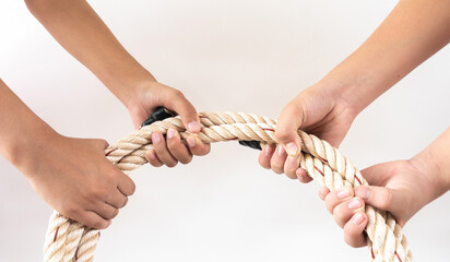 Hands holding rope forming a circle on hite background screen © prakasitlalao