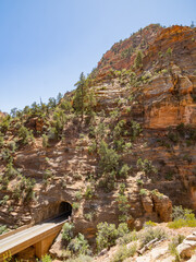 Obraz premium Sunny view of The Zion Mount Carmel Tunnel in Zion Ntaional Park