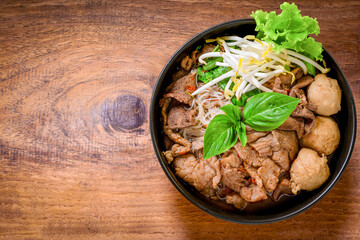 Pork Meatball Noodles with Thai Soup Thai people call it condensed boat noodles. Thai food concept.