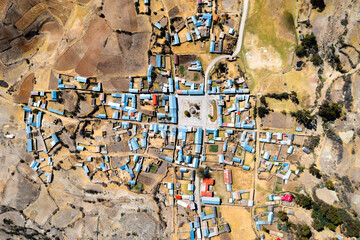 Aerial view of a village in the Peruvian Andes - obrazy, fototapety, plakaty