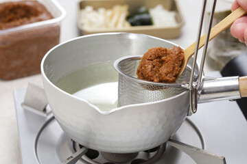 How to make miso soup. Add miso paste
