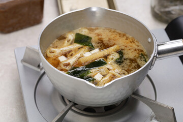 How to make miso soup.  Combine with ingredients. Do not bring to a boil.