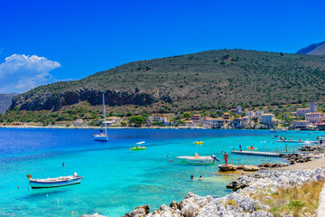 Fototapeta premium Scenic view from the picturesque seaside village Limeni. Traditional houses and colorful stoned buildings in Limeni, Mani area, Laconia, Greece