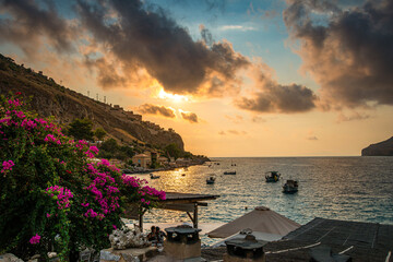 Fototapeta premium Scenic view from the picturesque seaside village Limeni. Traditional houses and colorful stoned buildings in Limeni, Mani area, Laconia, Greece