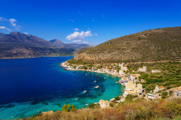 Obraz premium Scenic view from the picturesque seaside village Limeni. Traditional houses and colorful stoned buildings in Limeni, Mani area, Laconia, Greece