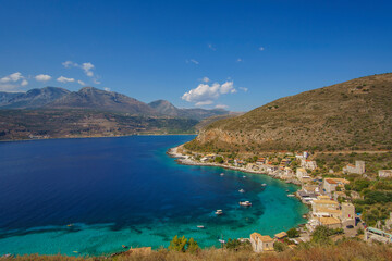 Obraz premium Scenic view from the picturesque seaside village Limeni. Traditional houses and colorful stoned buildings in Limeni, Mani area, Laconia, Greece