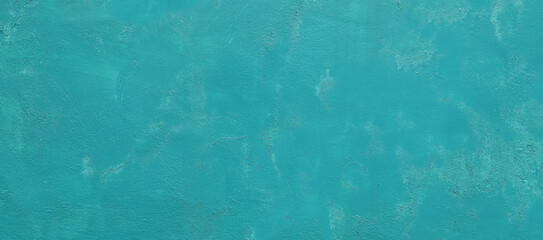 Abstract painted wall color texture, pastel blue background, wide composition