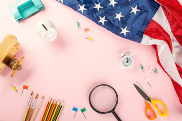 Back to school or college concept. Top view of school supplies stationery and American flag, studio shot isolated on pink background, Back to education new normal during outbreak of coronavirus © sorapop
