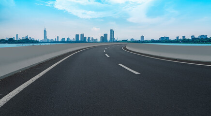 Fototapeta premium Asphalt Pavement Skyline and Nanjing Architectural Landscape