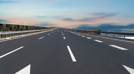 Fototapeta premium Skyline of Asphalt Pavement and Blue Sky and White Cloud