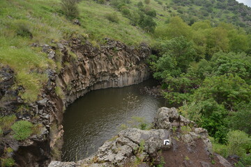 The Hexagon Pool is a natural pool in the Meshushim Reserve, in the central Golan Heights, Israel. The pool is named after the shape of the hexagonal basalt columns that that make up its walls