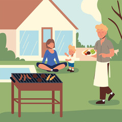 happy family cooking backyard
