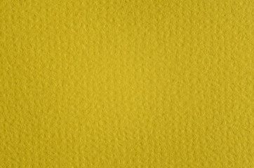 Yellow paper macro photography, detailed background paper uneven texture. Blank copy space