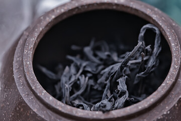 large leaf Chinese tea in a teapot, infusion