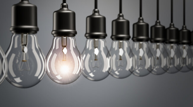 3d Render,Close up glowing hanging light bulb,Concept idea on dark color tone.