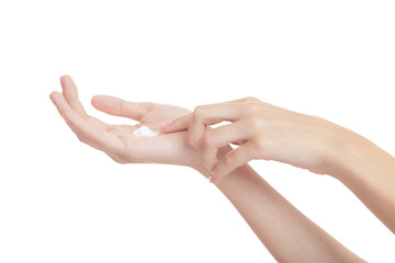 Female hands isolated on white background. Moisturizing hands with cream. Applying the cream to the...