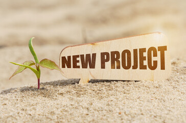 Near the sprout there is a plate with the inscription - NEW PROJECT