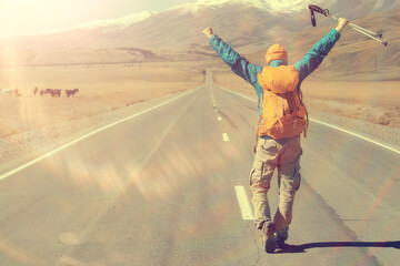 Fototapeta na wymiar highway adventure backpack man landscape trekking, mountains view freedom