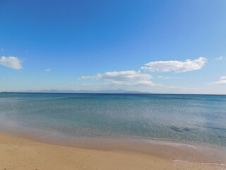 Fototapeta na wymiar A beautiful sandy beach with clear waters, in Attica, Greece