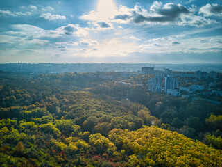 Aerial view of the city at sunset. Beautiful autumn city landscape