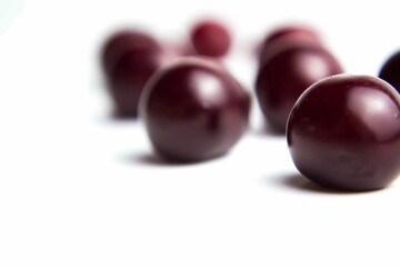 Ripe cherry on a white background. Place for the inscription in your article about the benefits of berries during beriberi.