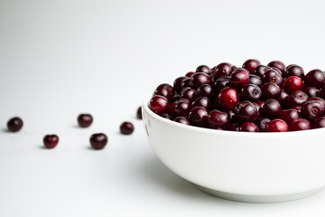 Cherry on a white background, juicy cherry for a photo wallpaper in your kitchen.