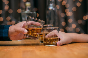 Celebrate whiskey on a friendly party in  restaurant