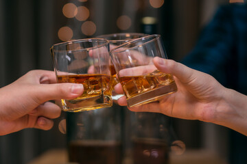Celebrate whiskey on a friendly party in restaurant