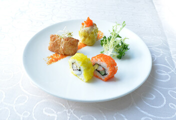 cold cut appetiser platter with meat, roasted, seafood, dim sum, scallop, sushi in white background asian halal menu