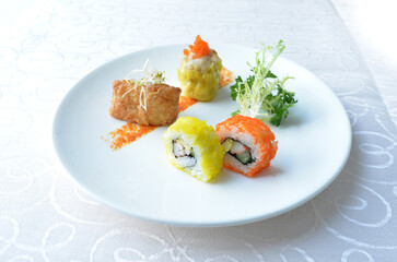 cold cut appetiser platter with meat, roasted, seafood, dim sum, scallop, sushi in white background asian halal menu