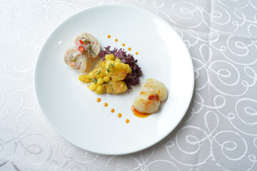 cold cut appetiser platter with meat, roasted, seafood, dim sum, scallop, sushi in white background asian halal menu