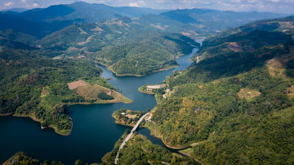 national reservoir or dam in the middle of the valley at chiang rai Thailand aerial view
