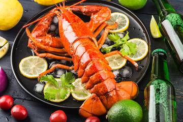 Seafood feast，Lemon and fresh Boston lobster on the ice