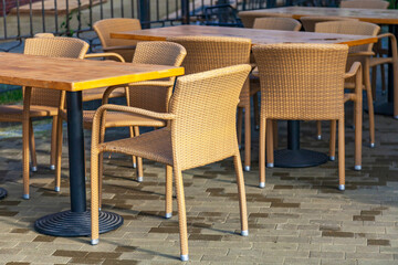 Fototapeta na wymiar Little tables of outdoor cafe